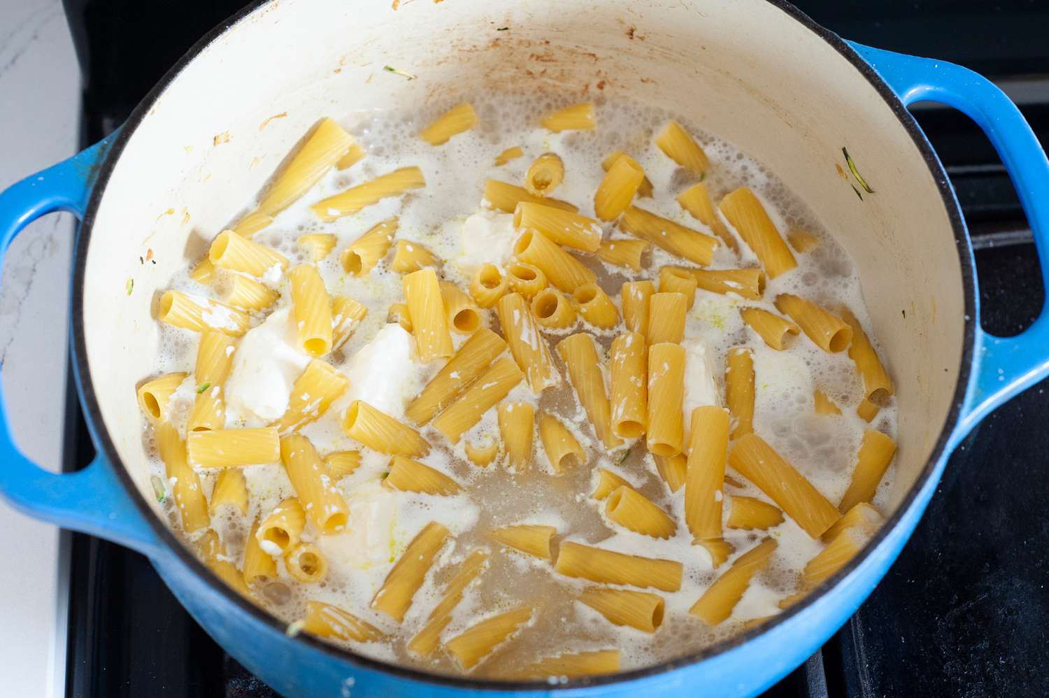 Cream Cheese and Pasta Boiling for One Pot Pasta with Zucchini
