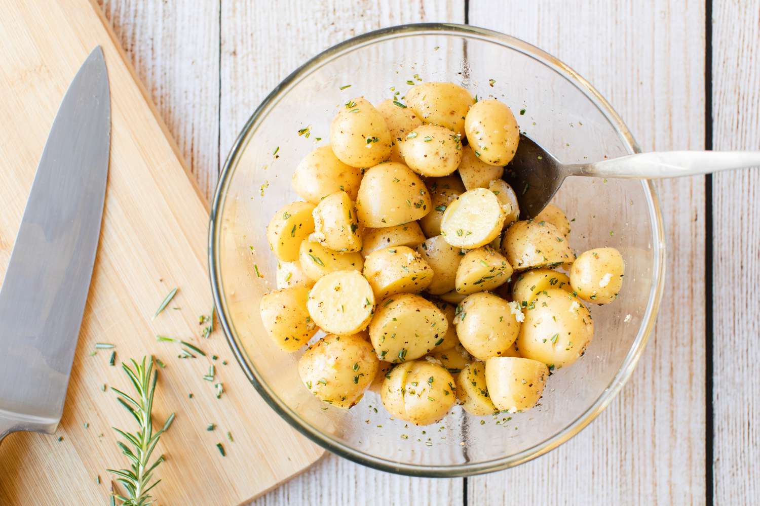 Potatoes Seasoned in a Bowl for Oven Roasted New Potatoes Recipe