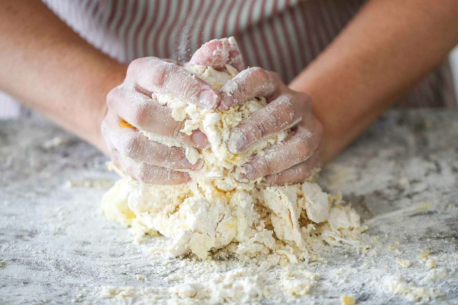 Homemade Pasta Noodles begin kneading the dough