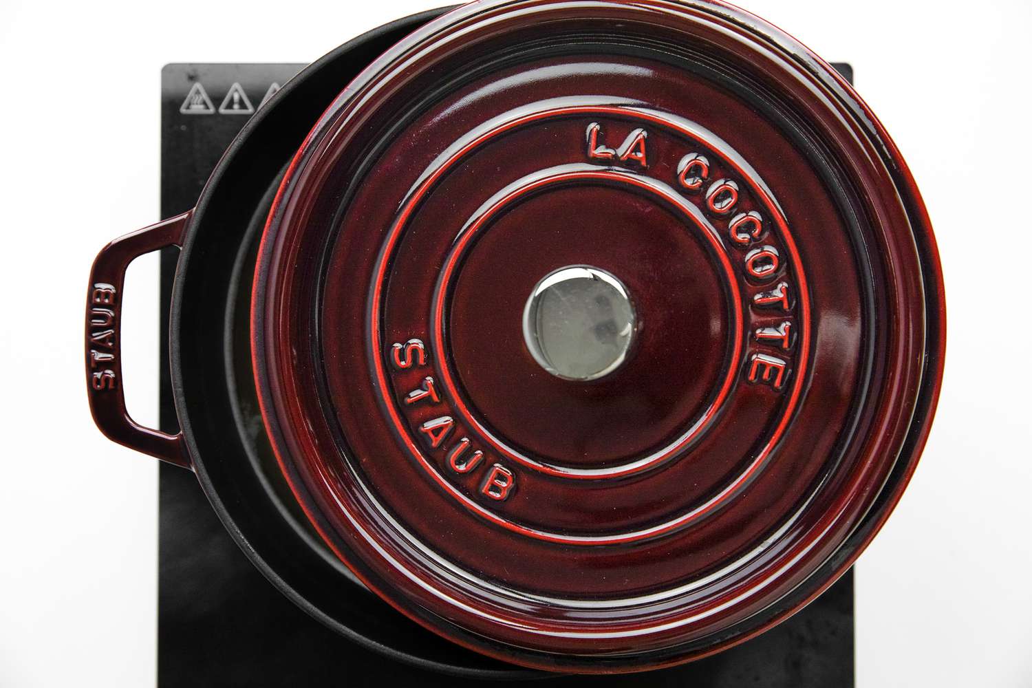 Chicken Congee Cooking in a Dutch Oven with the Lid Partially Open