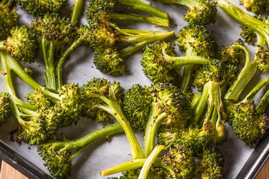 Roasted broccoli on a baking sheet
