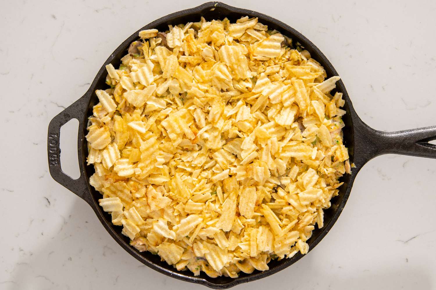 Tuna Noodle Casserole baked with potato chips on top