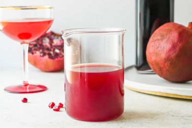 Grenadine in a glass cocktail mixer.