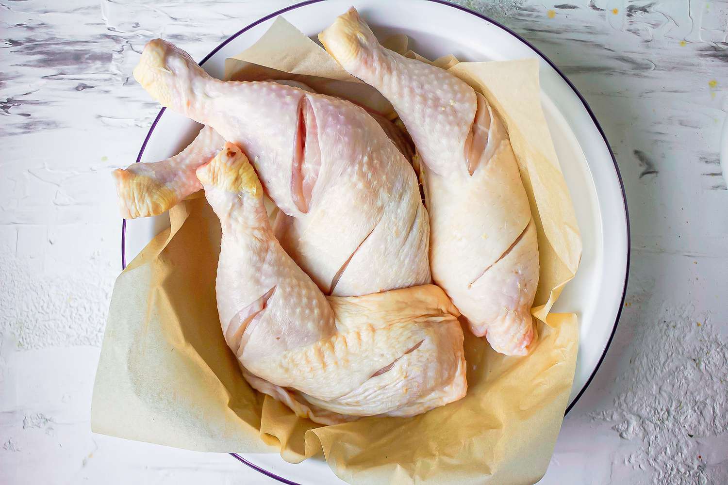 Sliced pieces of chicken for chicken yassa 