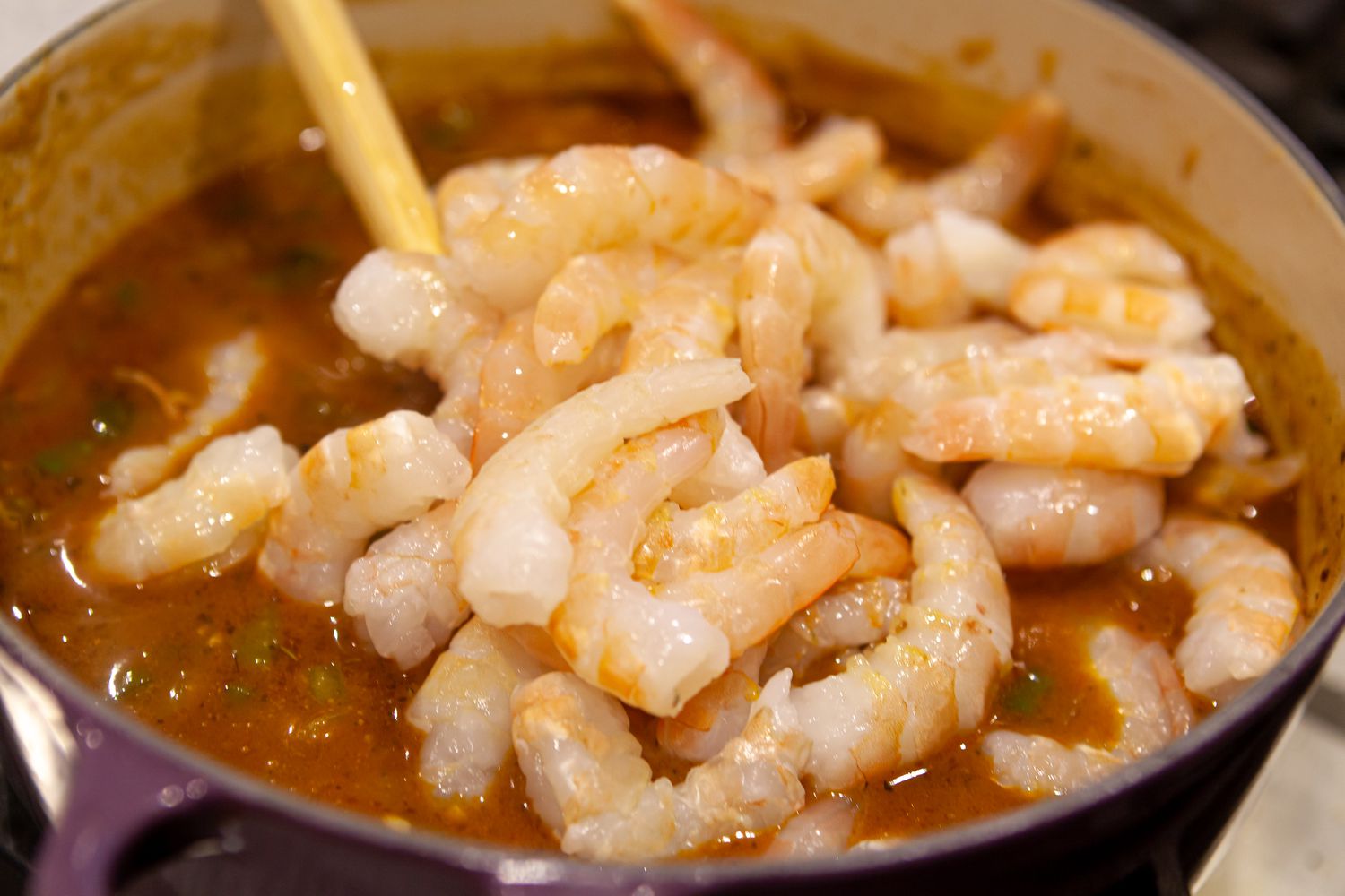 cajun shrimp added to etouffee pot