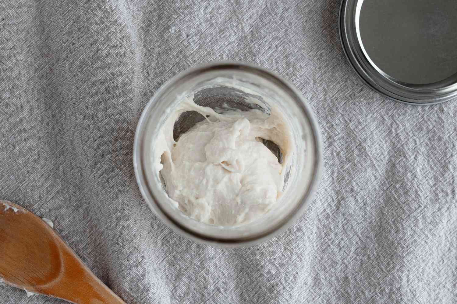 Overhead view of a mason jar to show how to make your own sourdough starter