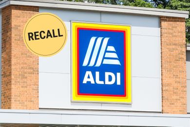 Aldi storefront with a recall symbol displayed