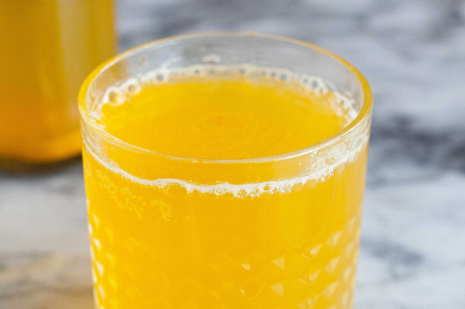 Fizzy homemade kombucha in a glass