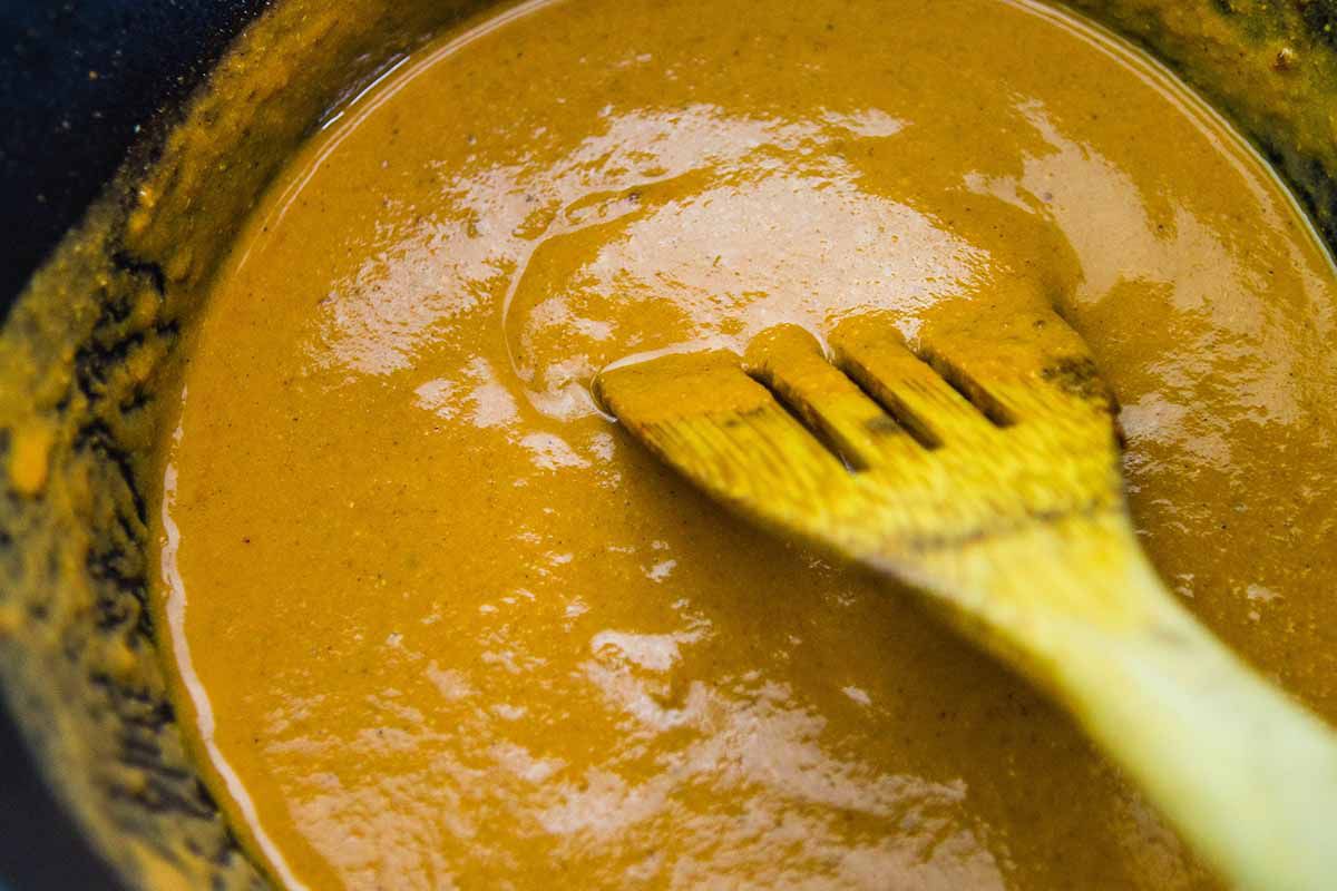Authentic Indian Butter Chicken Recipe stir the sauce