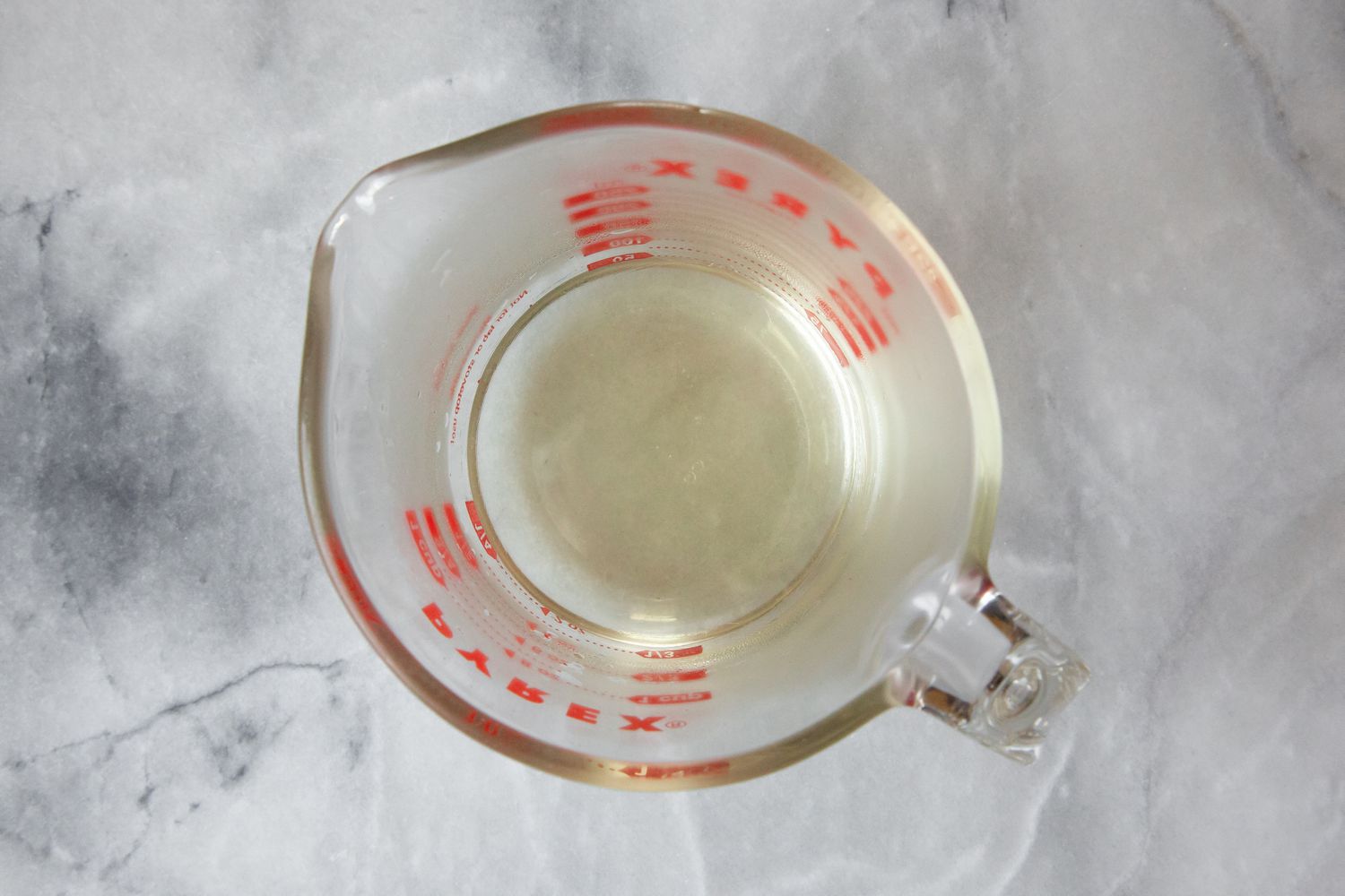 Rice Vinegar in a Measuring Cup for Sushi Rice