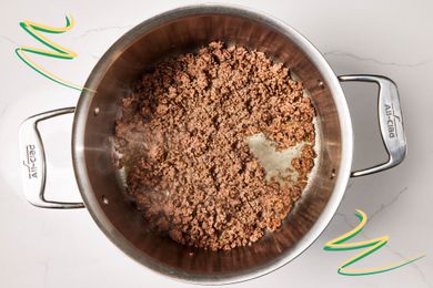 Photo of cooked ground beef with some illustrations on the corners 