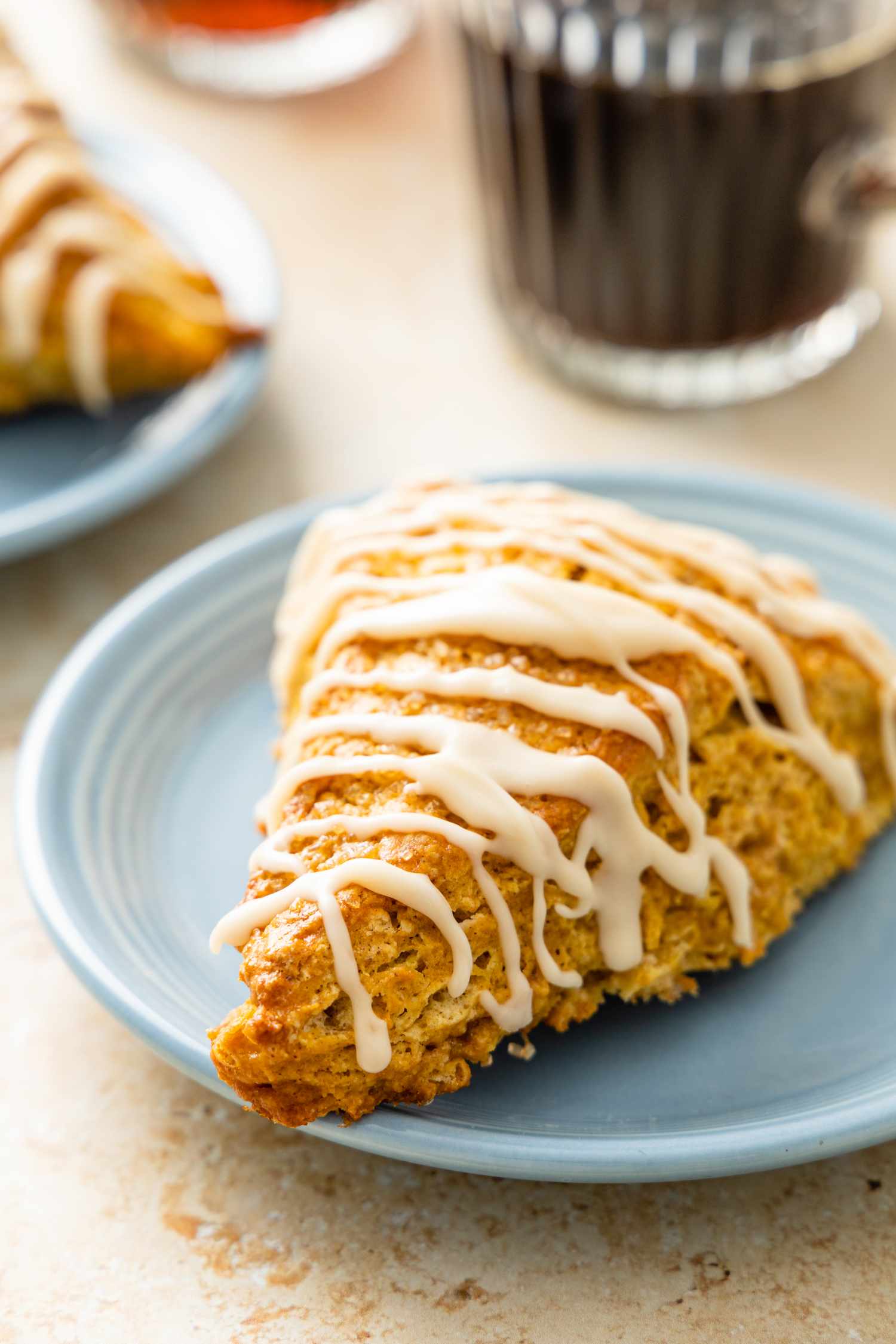 Pumpkin Scone with Maple Glaze on a Plate
