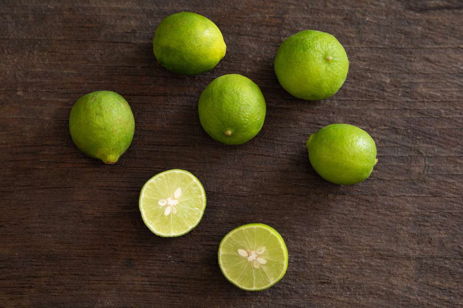 Key limes on dark background