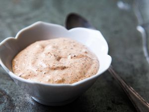 Remoulade Sauce in a white bowl with a spoon