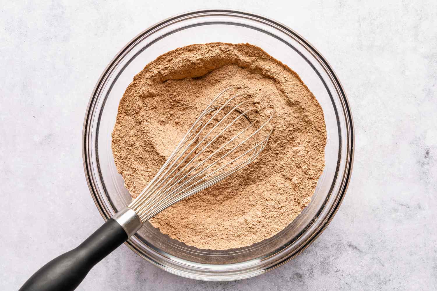 dry ingredients for first cake layer whisked together for chocolate pudding cake recipe