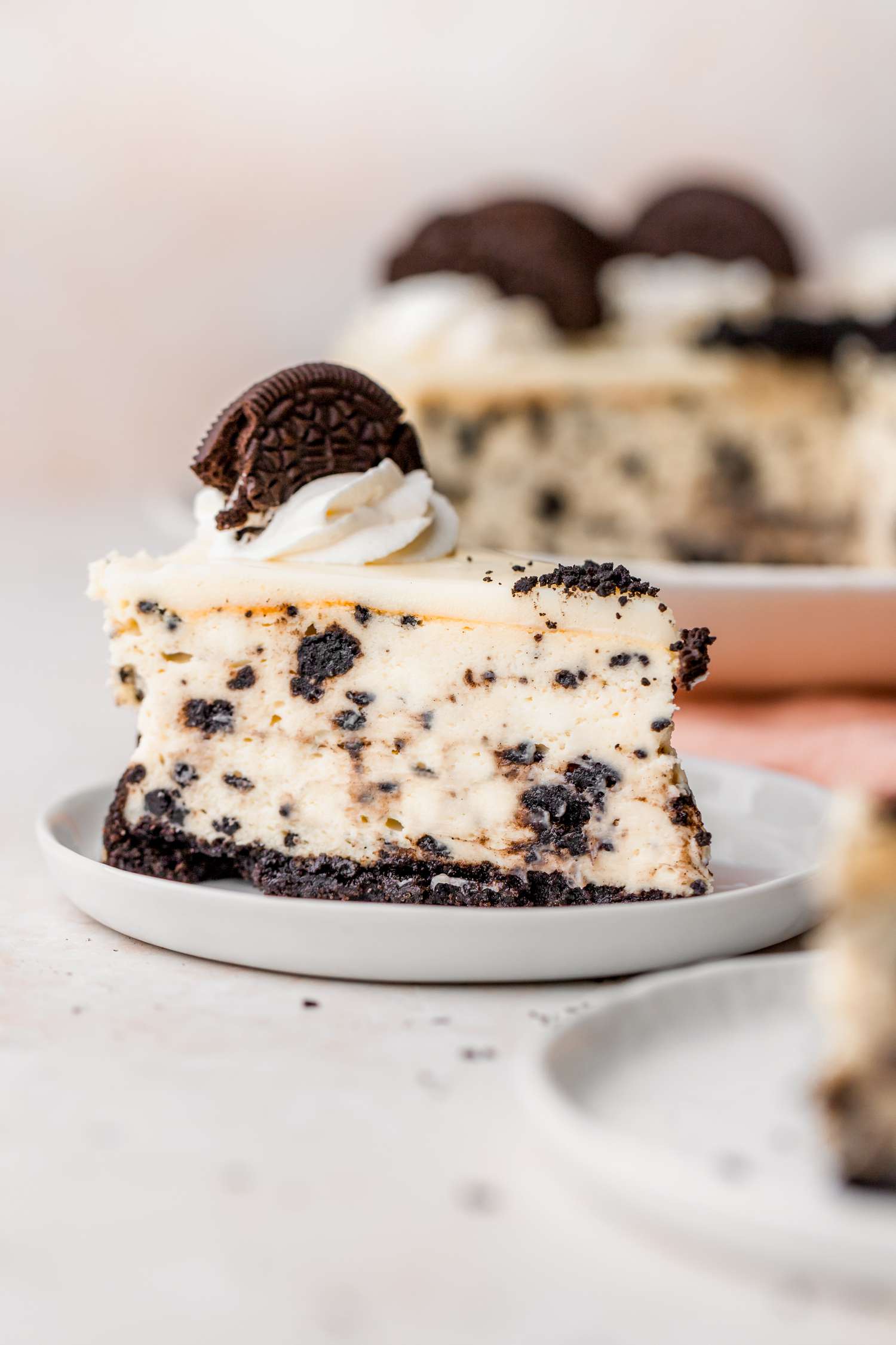 Oreo cheesecake slice on a plate