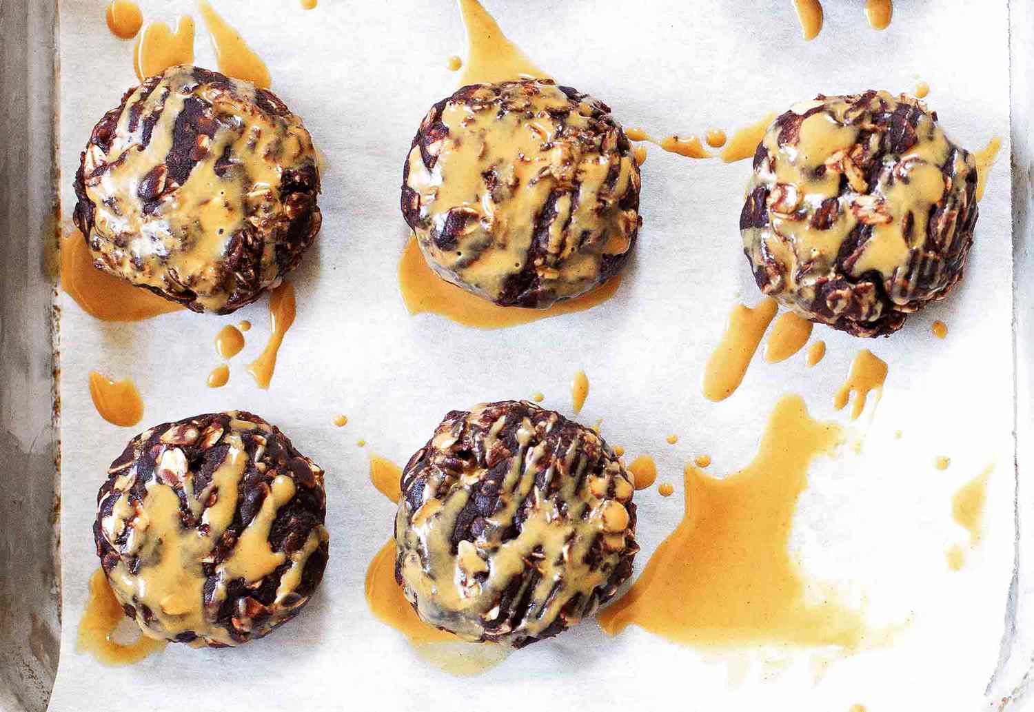 Chocolate Peanut Butter No Bake Cookies drizzled in peanut butter