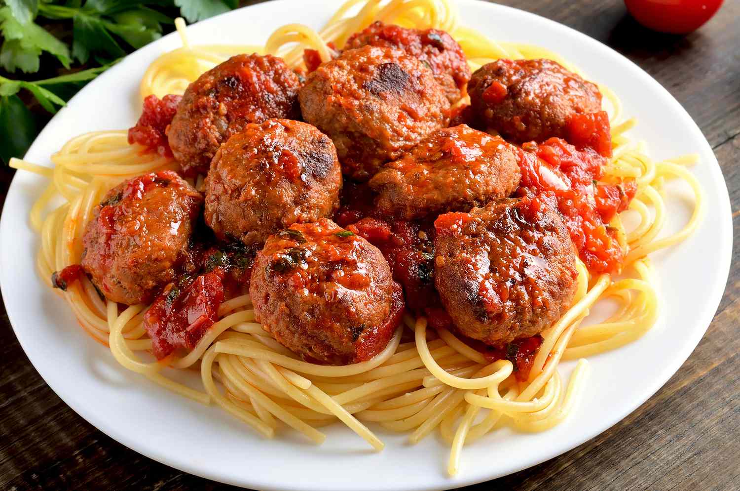 large plate of spaghetti with meatballs