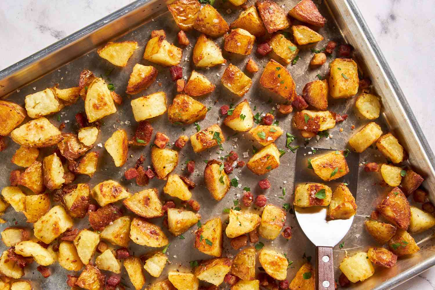 A sheet pan with roasted potatoes