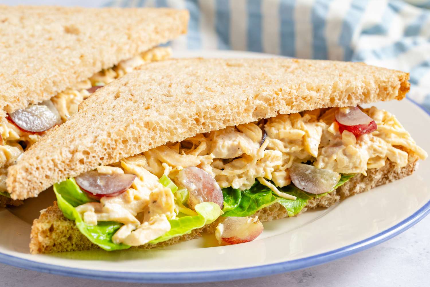 Chicken Salad with Grapes sandwich cut in half