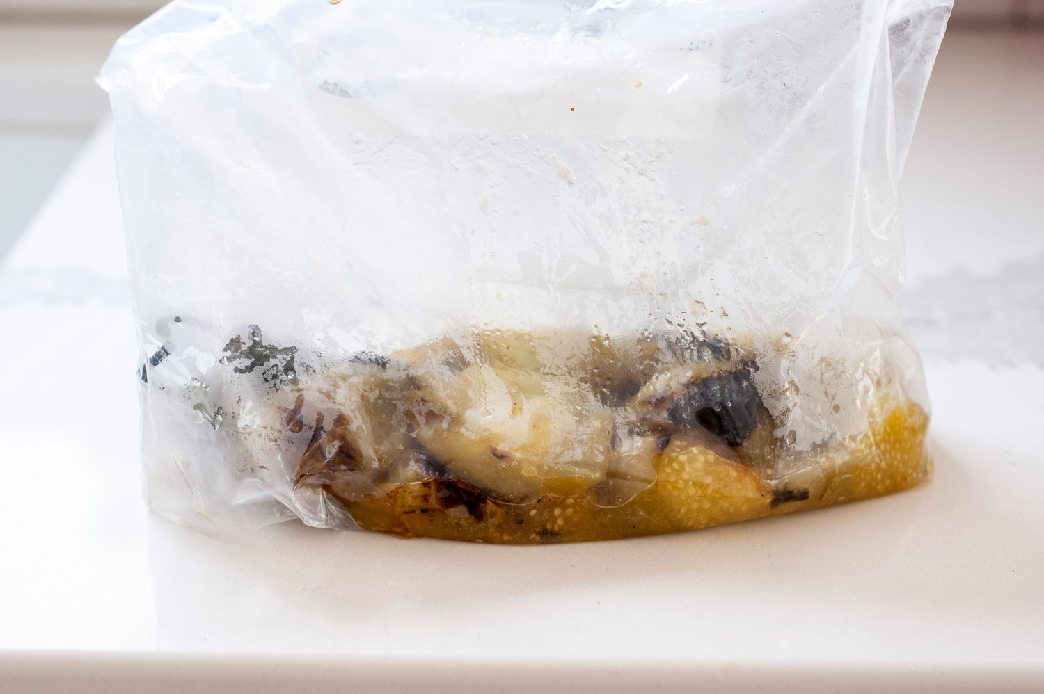 Roasted Tomatillo and Jalapeños in Ziploc Bag for Tomatillo Avocado Salsa Recipe