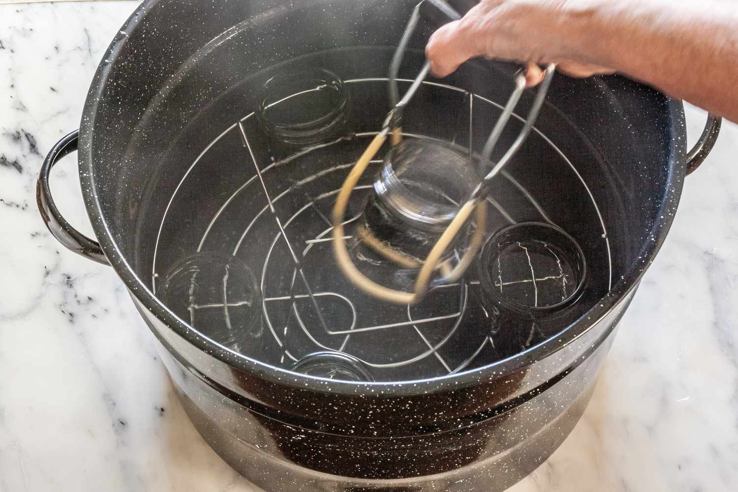 Remove Sterilized Jars from Pot 