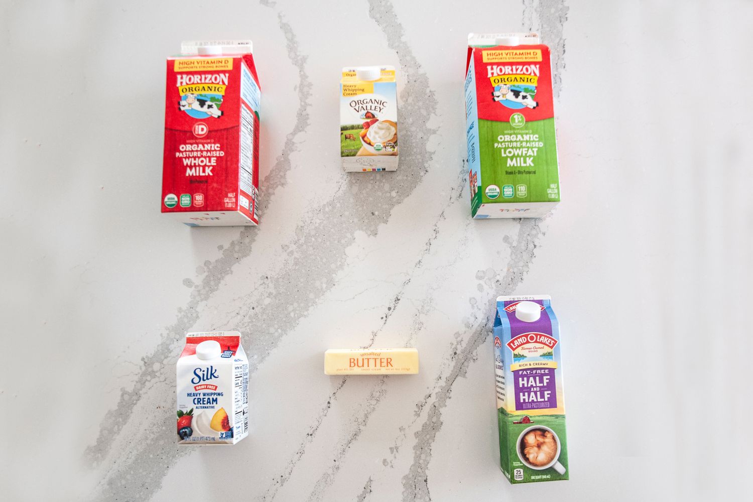 Variety of cartons showing half and half substitutes.