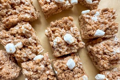Cinnamon flavored crispy rice treats with marshmallows on a surface