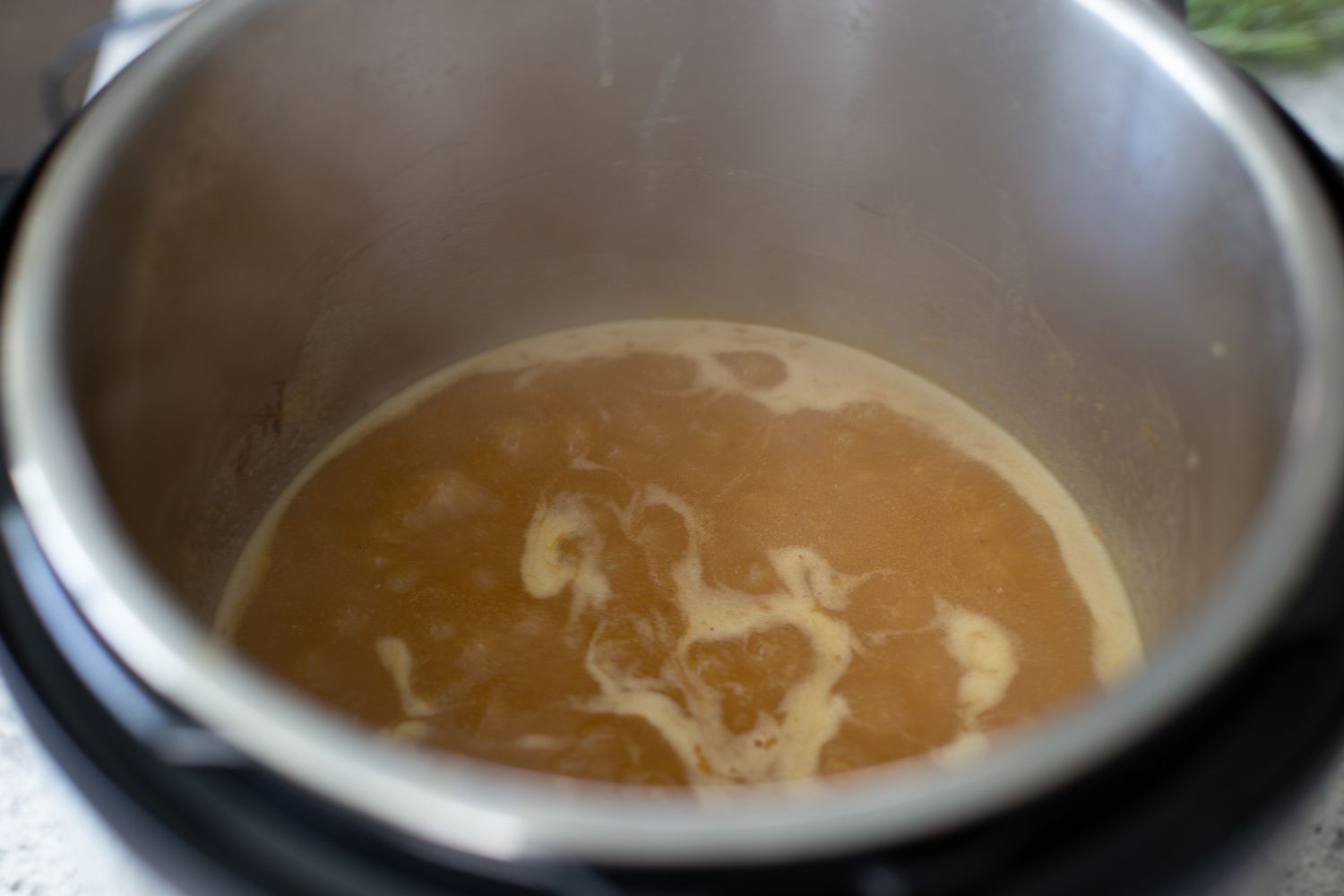 Gravy simmering in an Instant Pot.