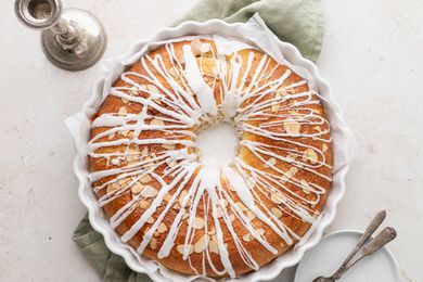 Overhead view of kringle topped with icing.
