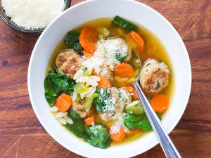 Turkey Meatball Soup in a white bowl with a spoon