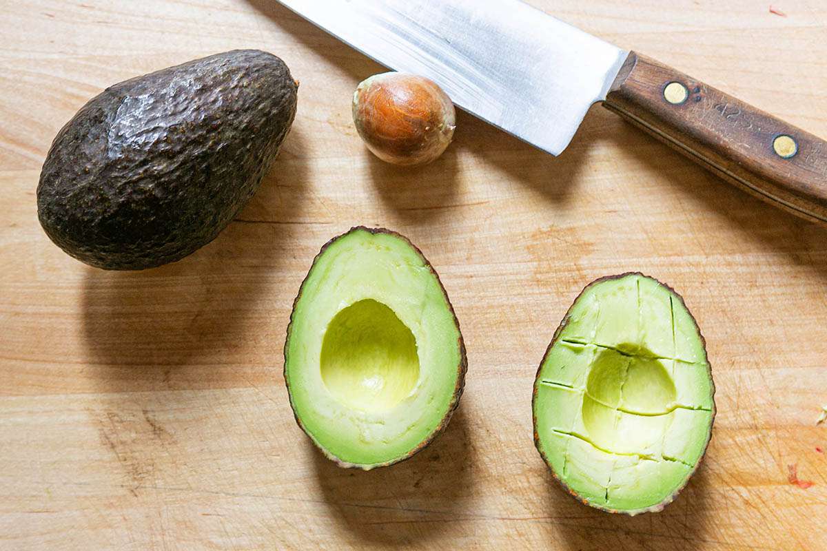 Remove the pit from the avocado with a chef knife