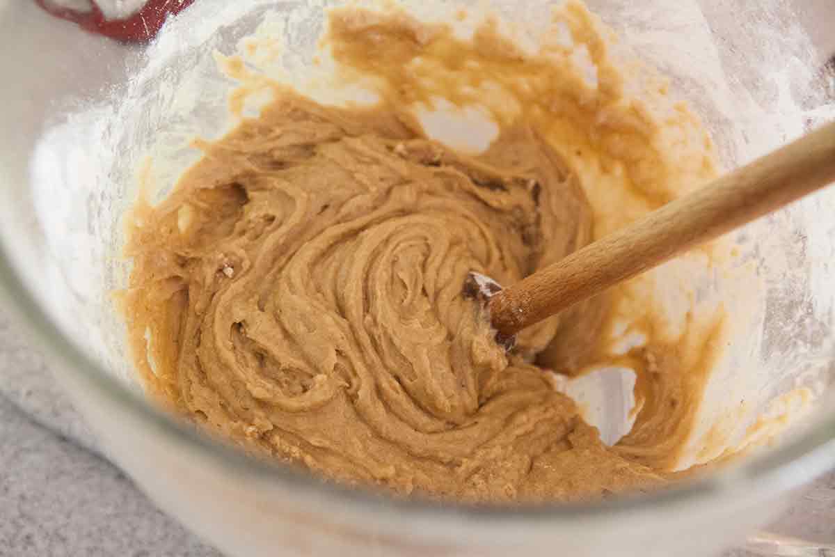 Add the flour to the oatmeal chocolate chip cookie dough batter