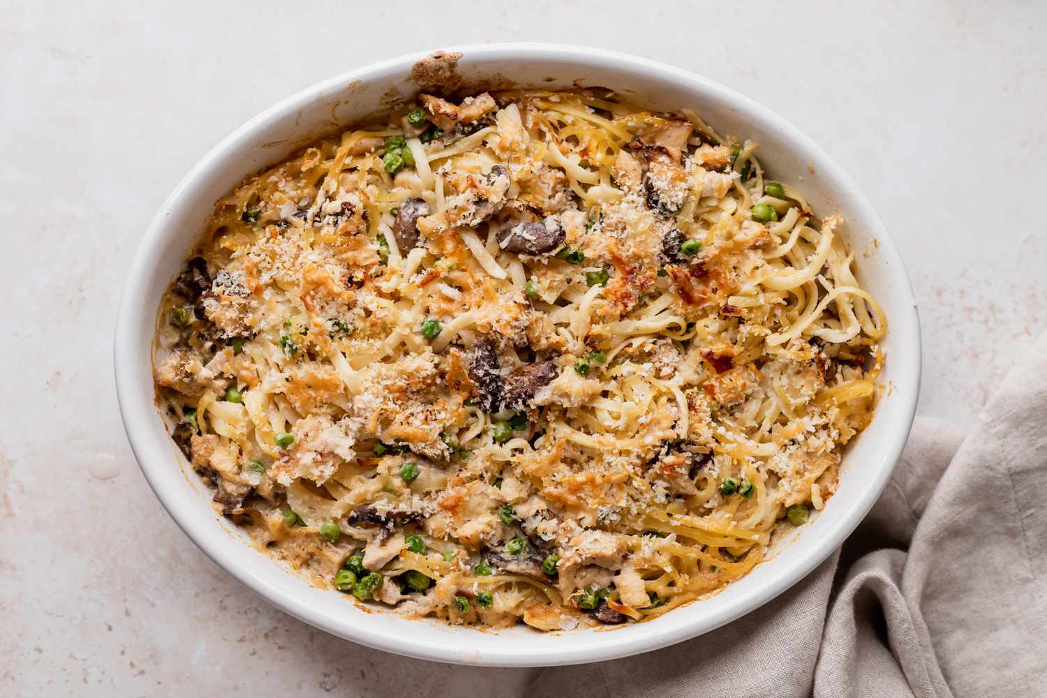 Old fashioned turkey tetrazzini recipe in a casserole dish.