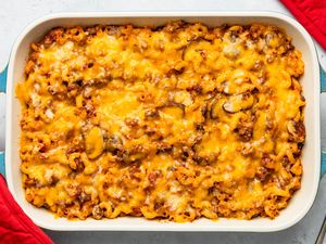 Baked pasta casserole topped with melted cheese in a rectangular dish