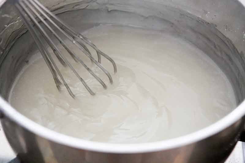 Whisking lemon curd filling for easy lemon meringue pie