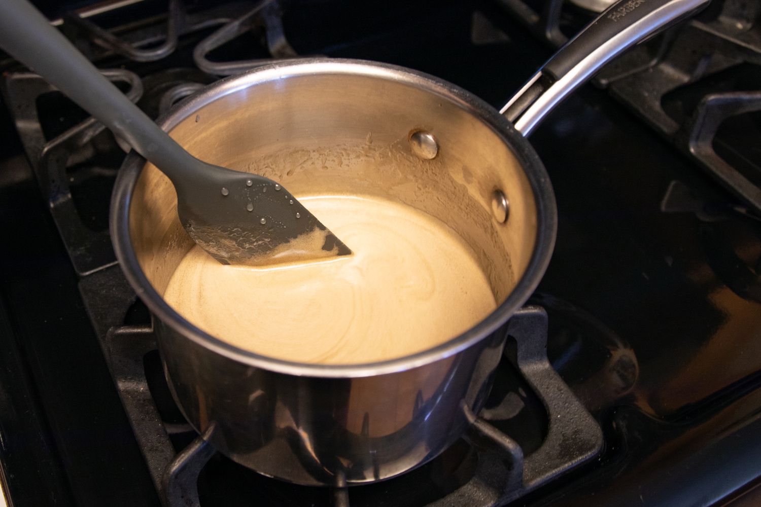 Ingredients in a pot to make Dixieland Peanut Pie with Porter.