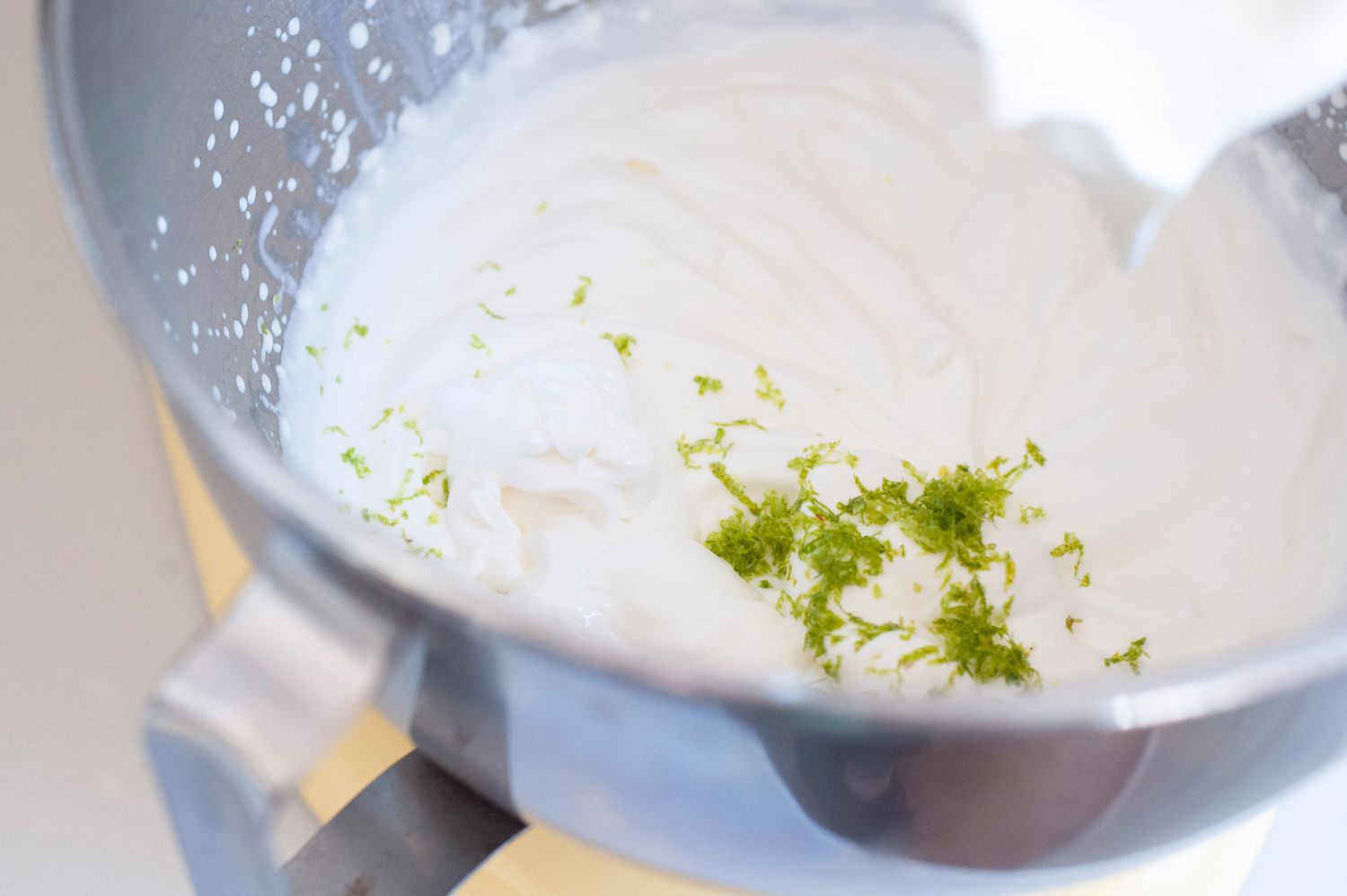 Add key lime zest to whipped cream topping.