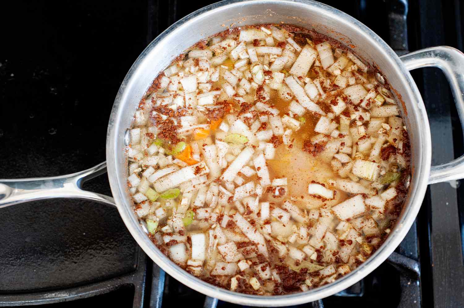 “Ripe Figs” lemon chicken soup in a pot on the stove.