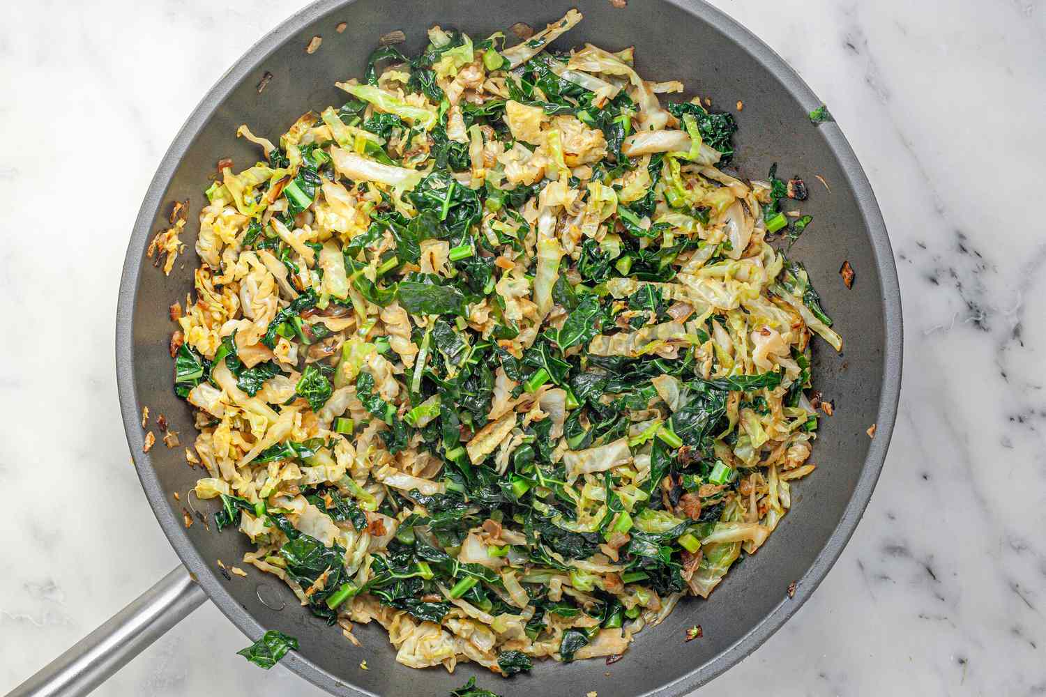 Cooked Cabbage and Kale on Skillet for Bubble and Squeak Recipe