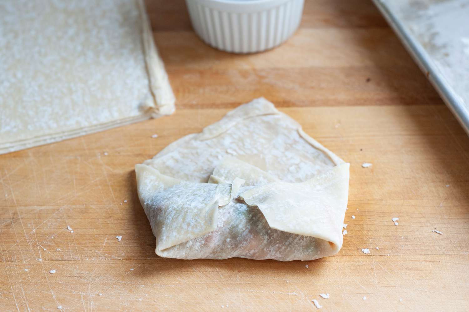 Filling and wrappers for deep fried egg rolls.