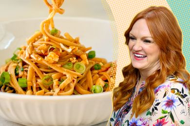 Ree Drummond smiling beside a plate of noodles