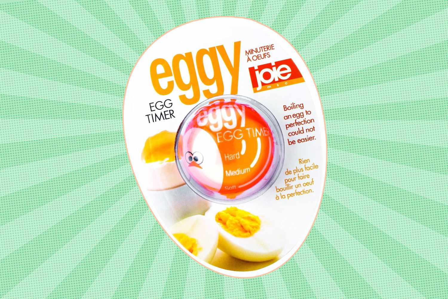 A package of an Eggy egg timer with hardboiled egg illustrations against a green radial backdrop