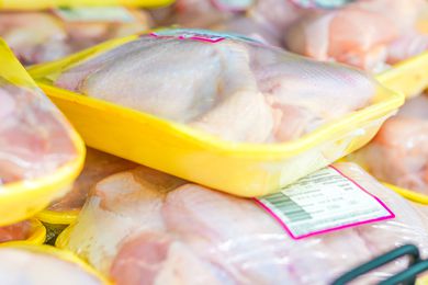 packaged raw chicken in a grocery store
