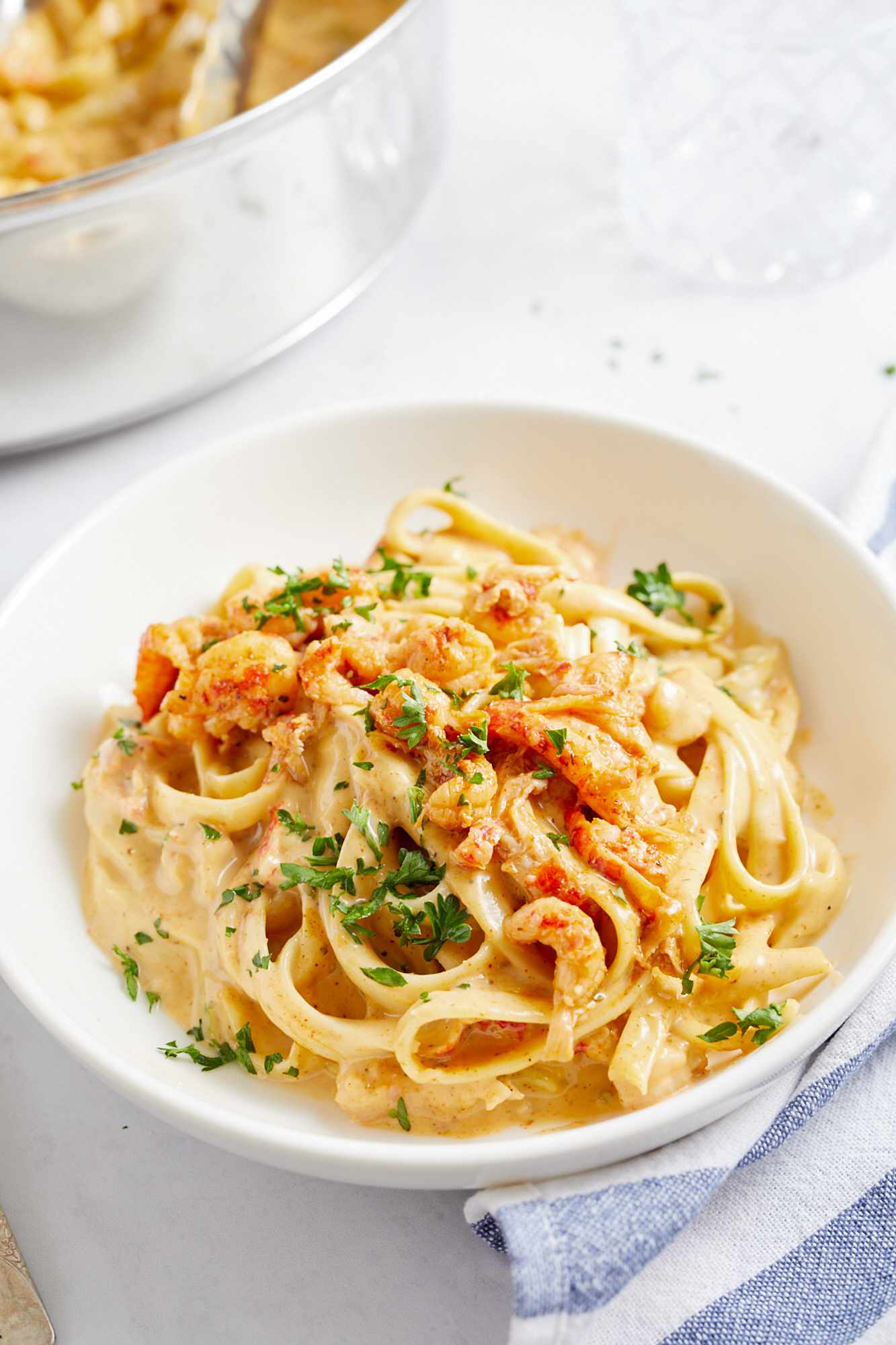 Cajun shrimp alfredo in a white bowl