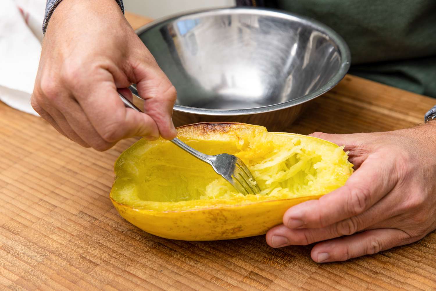 Fork Scraping Spaghetti Squash into "Spaghetti" Strands 