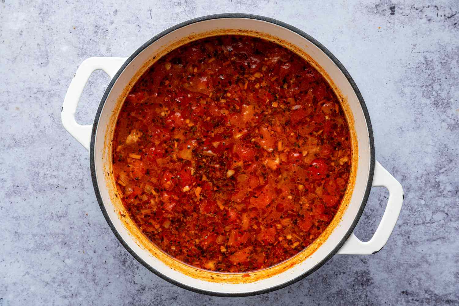 Broth, Tomatoes, and Water Added to Dutch Oven for Lasagna Soup