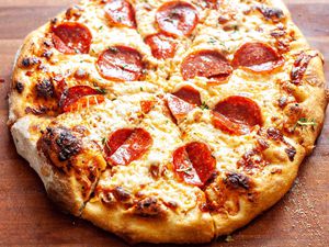 Crispy crust and cheese on a pepperoni pizza made at home