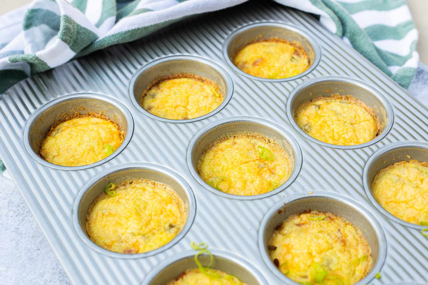 Baked Ham, Cheddar, and Green Chile Egg Bites in a Muffin Tin