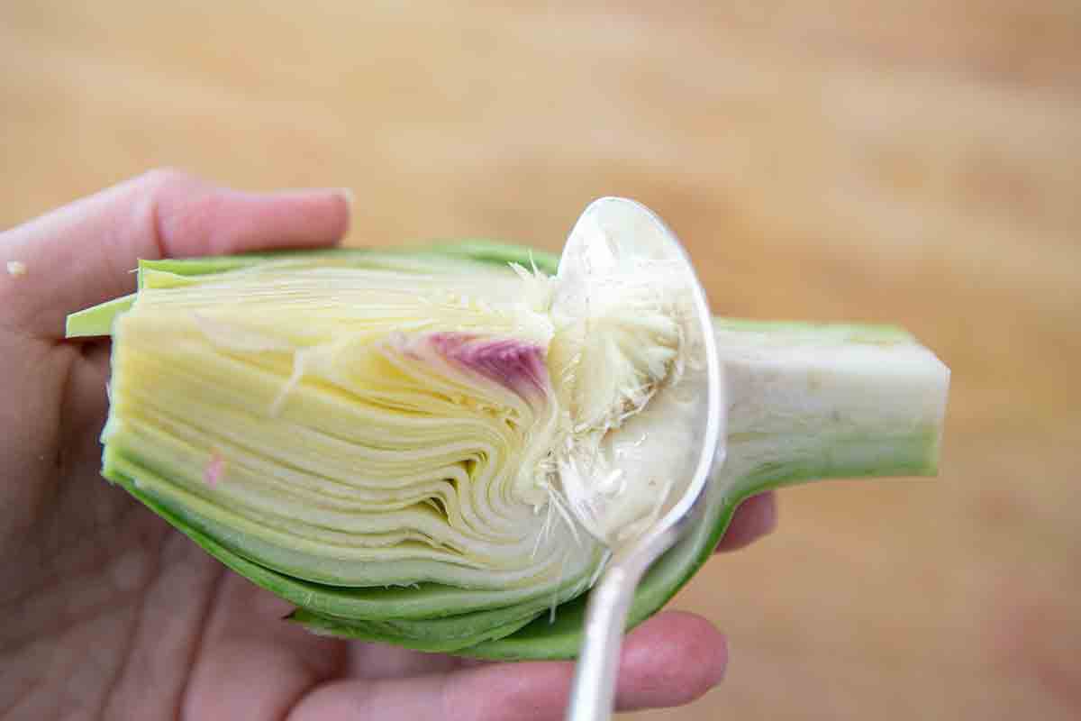 scoop out choke from artichoke
